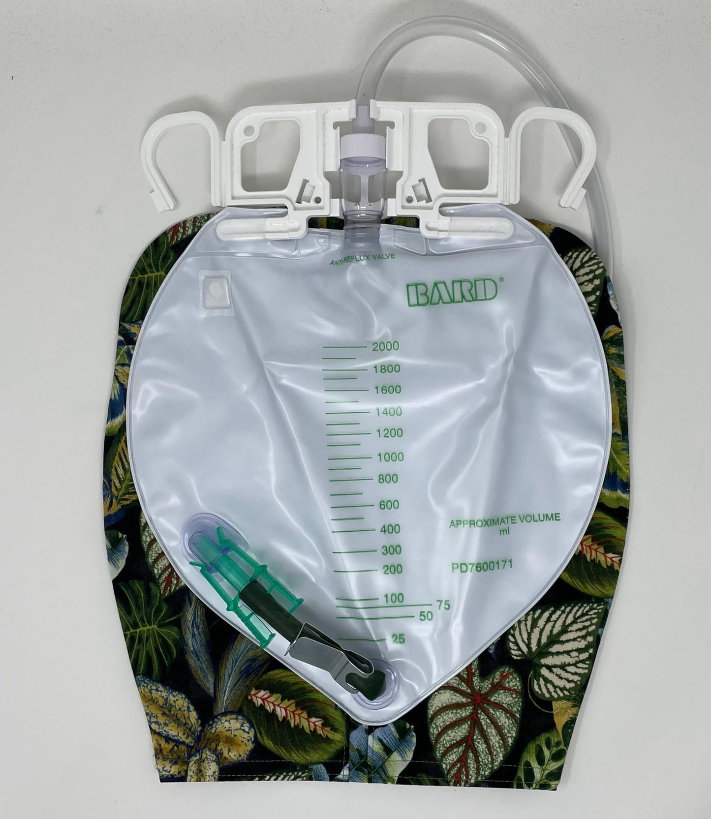 Tropical plant catheter bag cover fits 2000ml urine collection system; Zip closure, weighted open hem. Confident in public with bag