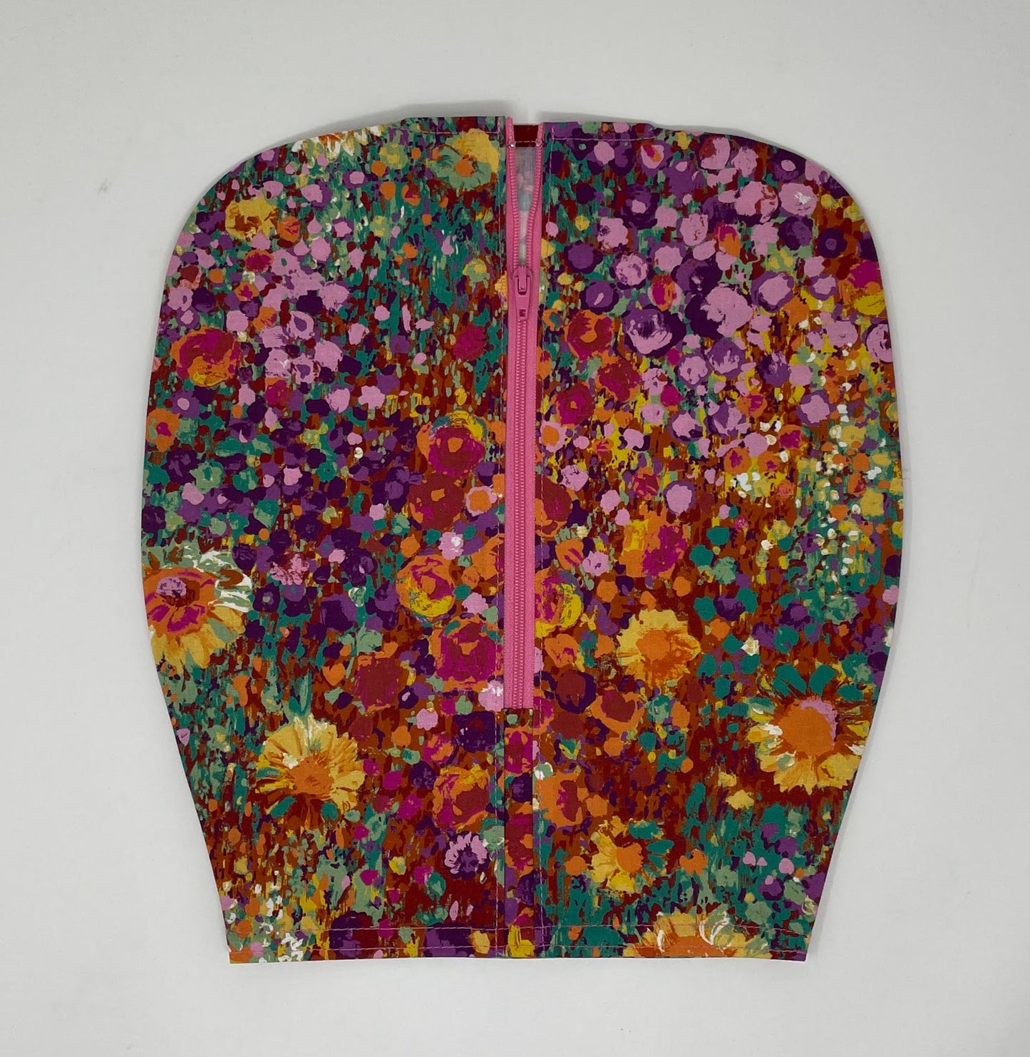 Bright floral catheter bag cover for 2000ml one or two hook hanger bag styles. Empty without removing cover. Zip front keeps cover in place.