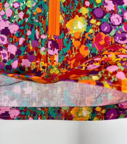 Bright floral catheter bag cover for 2000ml one or two hook hanger bag styles. Empty without removing cover. Zip front keeps cover in place.