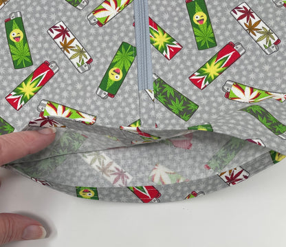 Joint lighters catheter bag cover, double hanger style. Weighted open hem for easy drain port access. Foley user dignity bag cover