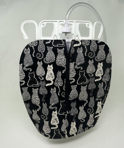Cats urine bag cover with zip front; open hem to easily access drain port to empty. Catheter bag discreetly hidden from public view, modest