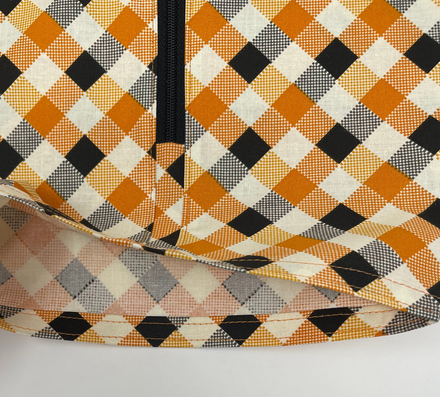 Gold and black plaid catheter bag cover