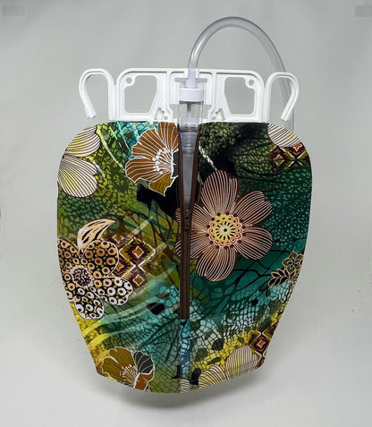 Conceal catheter bag from view with this bright floral cover.  Use day or night. Private, modest and stylish way to hide collection contents. Tubing cover included.