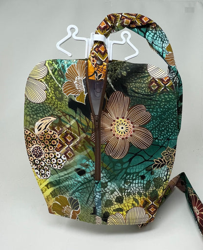Conceal catheter bag from view with this bright floral cover.  Use day or night. Private, modest and stylish way to hide collection contents. Tubing cover included.