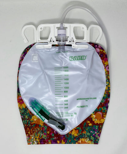Bright floral catheter bag cover for 2000ml one or two hook hanger bag styles. Empty without removing cover. Zip front keeps cover in place.